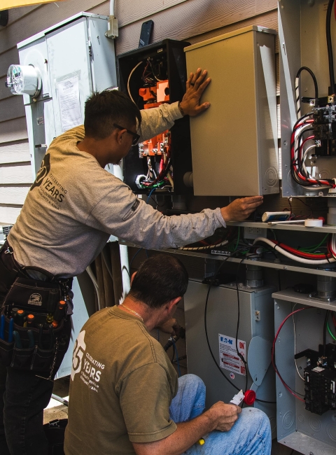 Alternate Energy Hawaii electricians wiring a home system